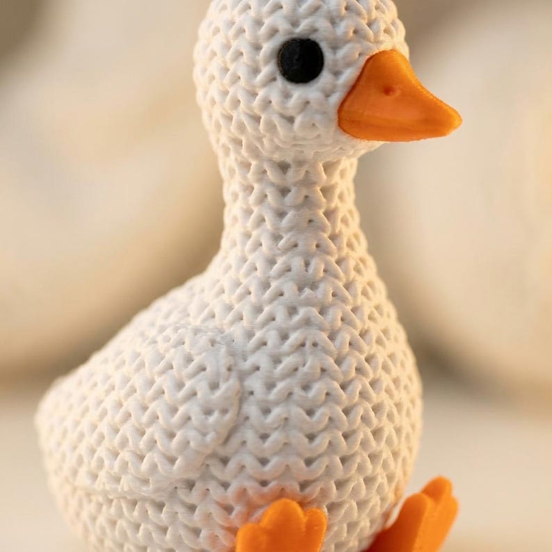 Knitted Look Goose Figurine on display